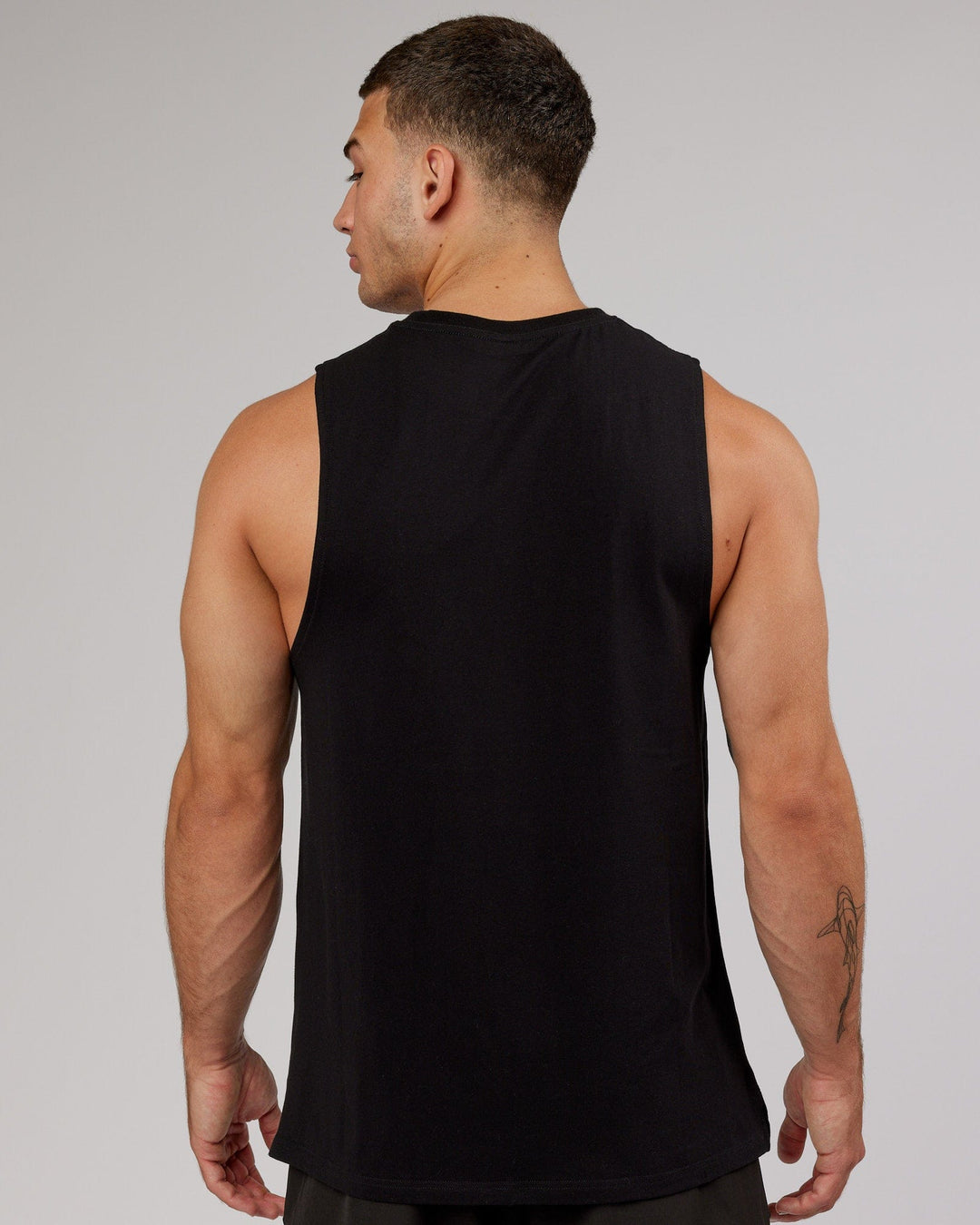 Man wearing Strength FLXCotton Training Fit Tank - Black-Black