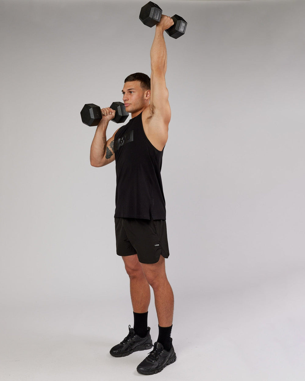 Man wearing Strength FLXCotton Training Fit Tank - Black-Black