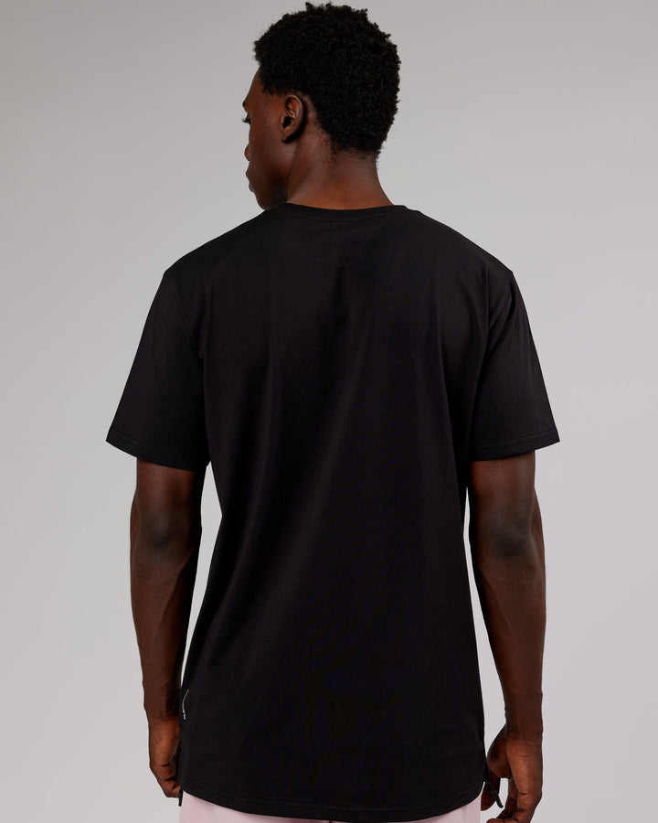 Man wearing Strength FLXCotton Tee - Black-Pink