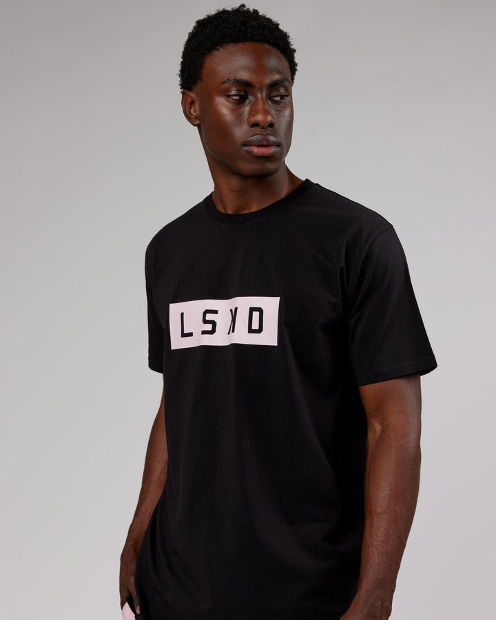 Man wearing Strength FLXCotton Tee - Black-Pink
