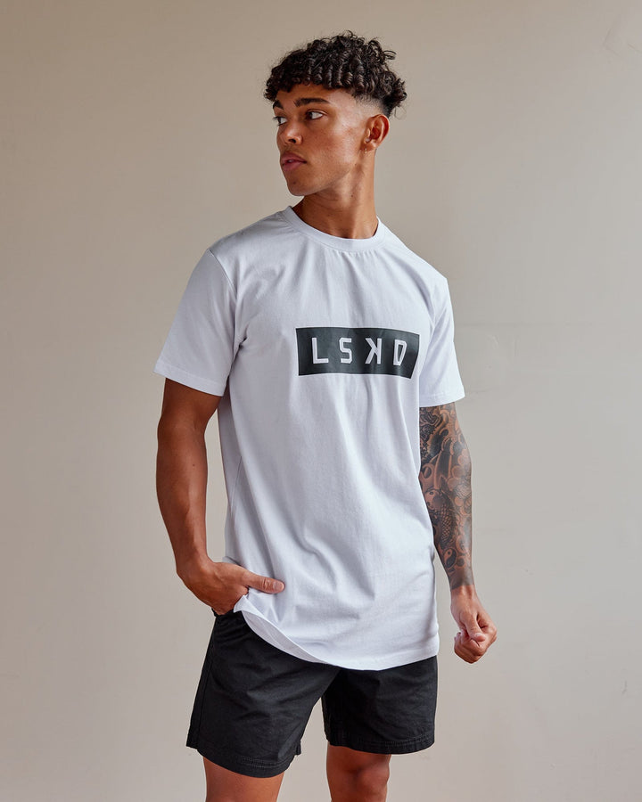 Man wearing Strength FLXCotton Tee - White-Black