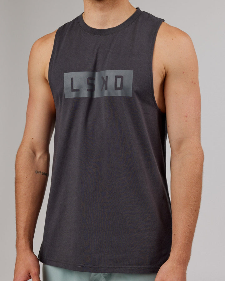 Man wearing Strength FLXDRY Training Fit Performance Tank - Asphalt