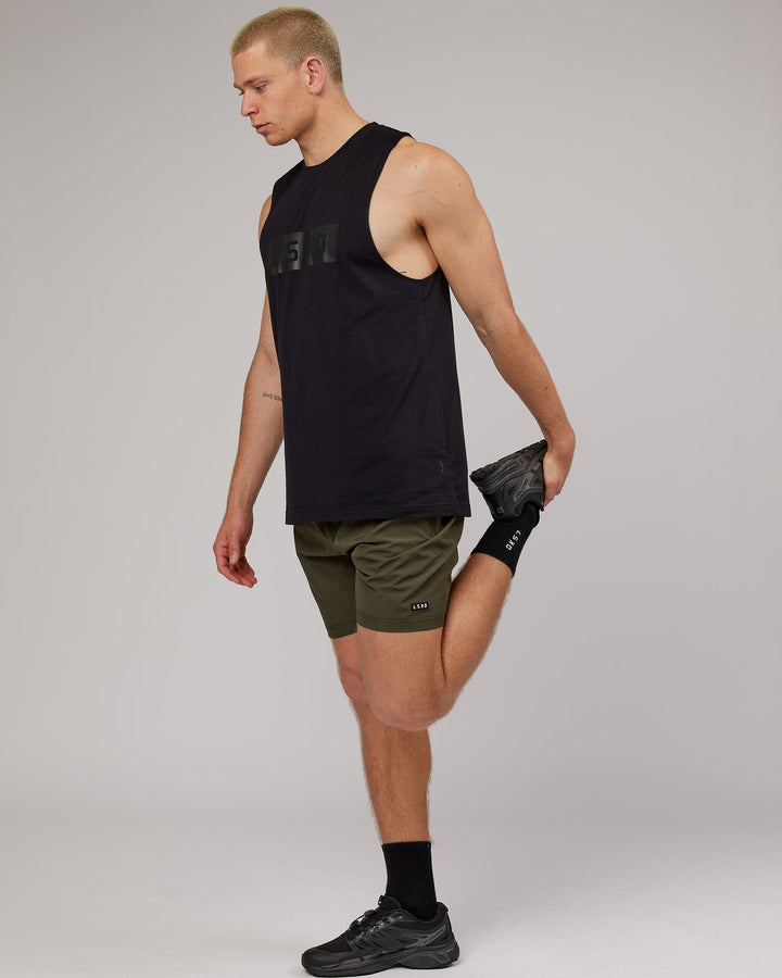 Man wearing Strength FLXDRY Training Fit Performance Tank - Black