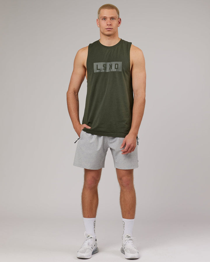 Man wearing Strength FLXDRY Performance Tank - Forest Night