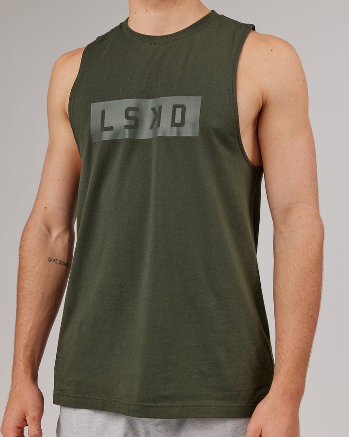 Man wearing Strength FLXDRY Performance Tank - Forest Night