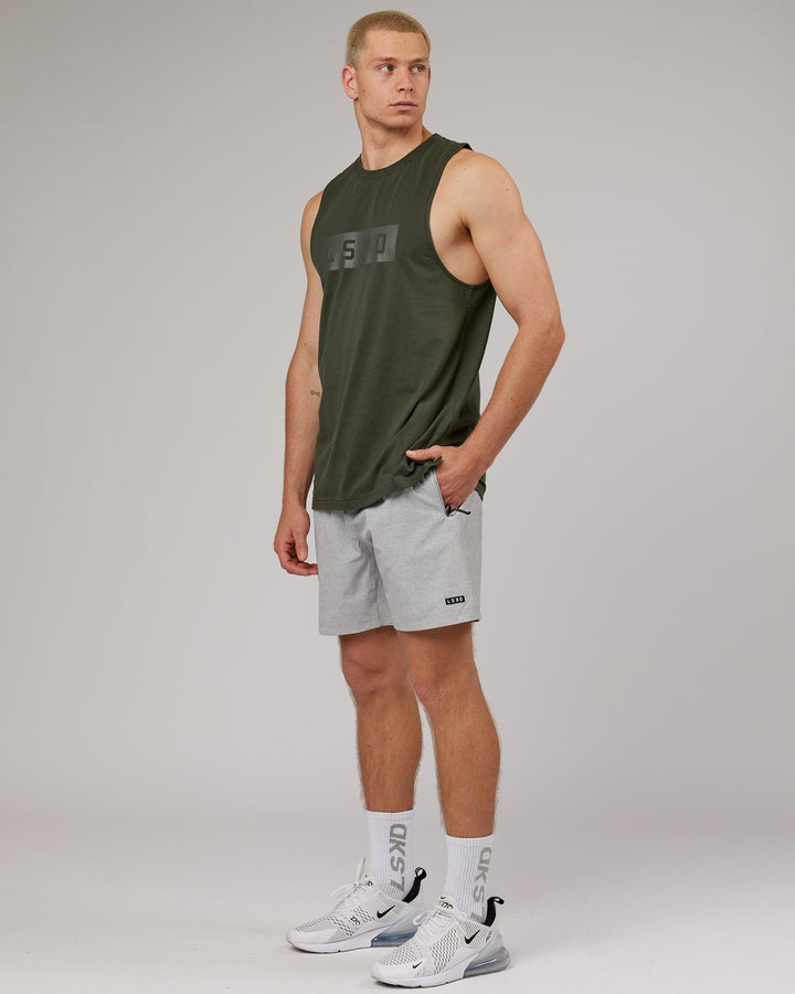 Man wearing Strength FLXDRY Performance Tank - Forest Night
