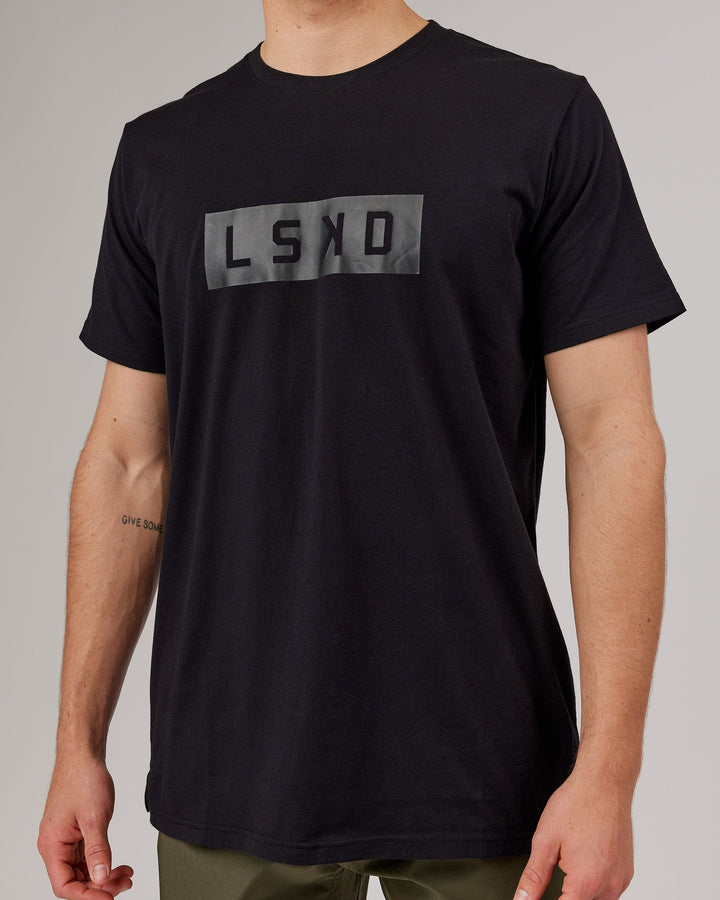 Man wearing Strength FLXDRY Performance Tee - Black-Black