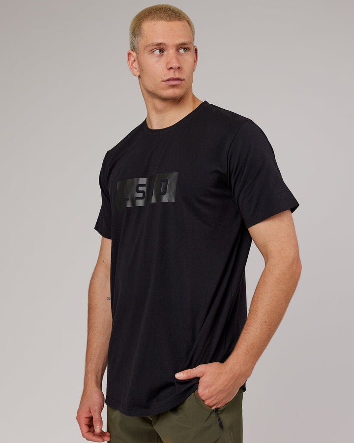 Man wearing Strength FLXDRY Performance Tee - Black-Black