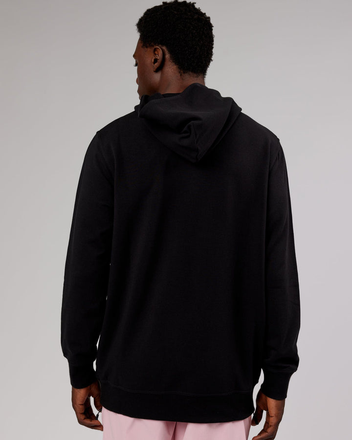 Man wearing Strength FLXFleece Pullover - Black-Pink