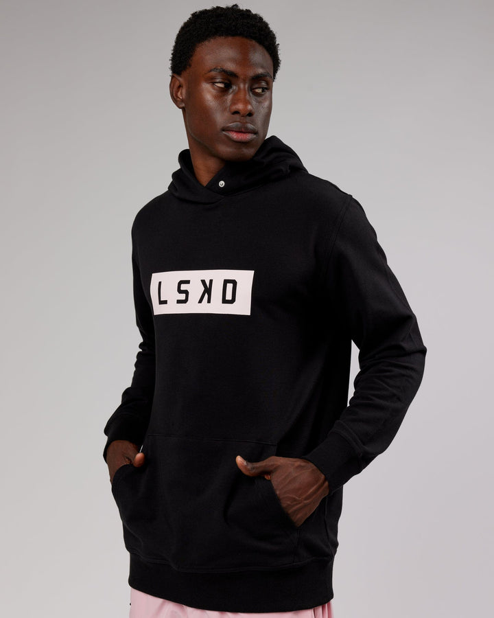 Man wearing Strength FLXFleece Pullover - Black-Pink
