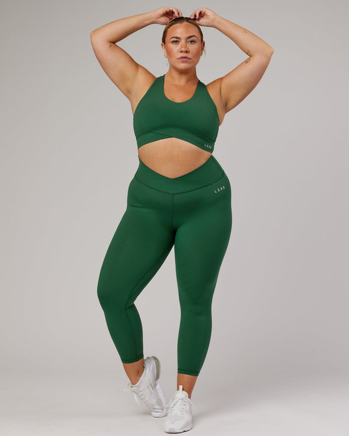 Woman wearing Strike 7/8 Length Tight - Pineneedle