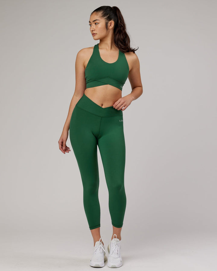 Woman wearing Strike 7/8 Length Tight - Pineneedle