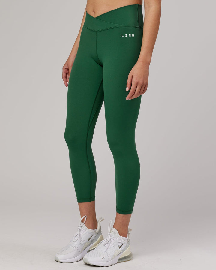 Woman wearing Strike 7/8 Length Tight - Pineneedle