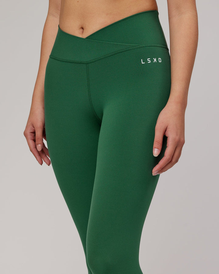 Woman wearing Strike 7/8 Length Tight - Pineneedle