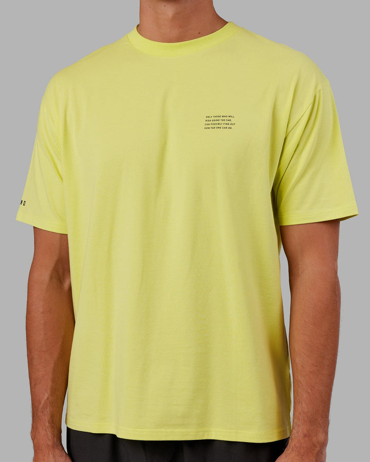 Man wearing Unisex Strive FLXCotton Tee Oversize - Citrus Green