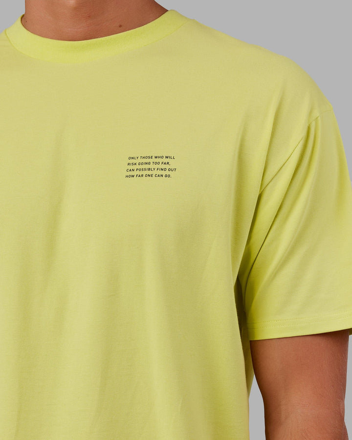 Man wearing Unisex Strive FLXCotton Tee Oversize - Citrus Green