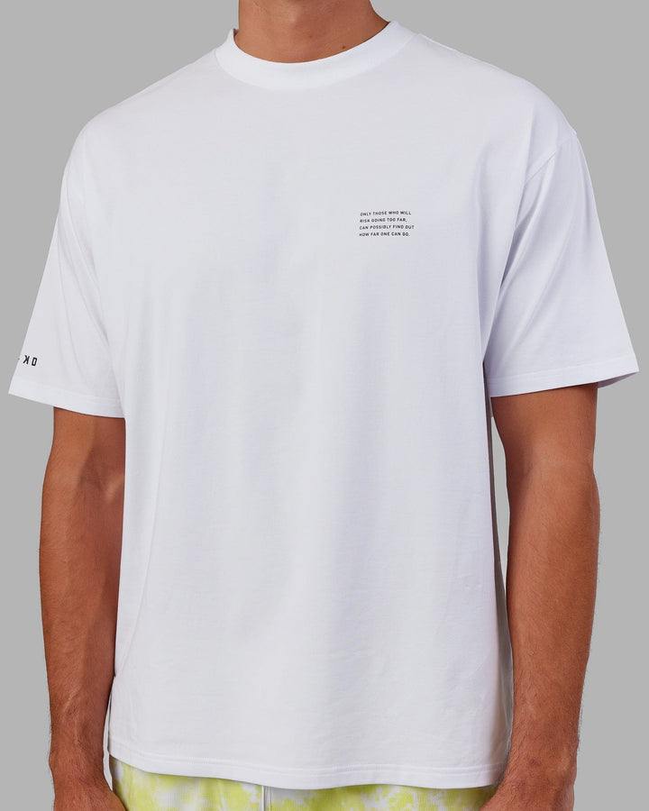 Man wearing Unisex Strive FLXCotton Tee Oversize - White