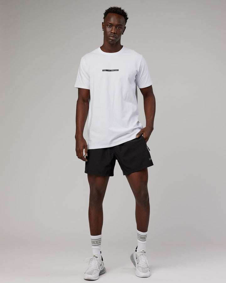 Man wearing Tape FLXCotton Tee Oversize - White