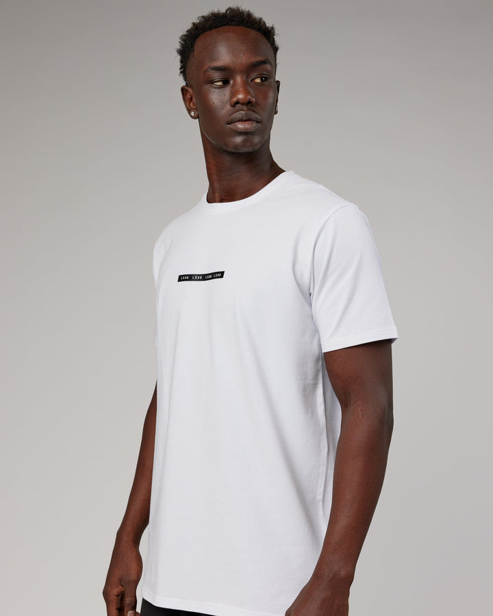Man wearing Tape FLXCotton Tee Oversize - White