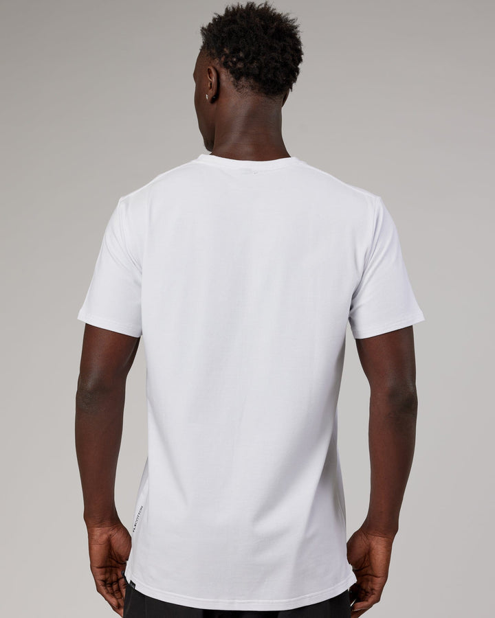 Man wearing Tape FLXCotton Tee Oversize - White