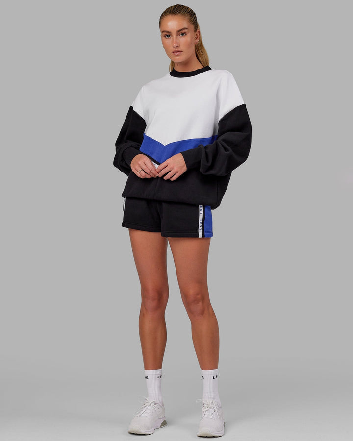 Woman wearing Time Out Sweater Oversize - Black-Power Cobalt