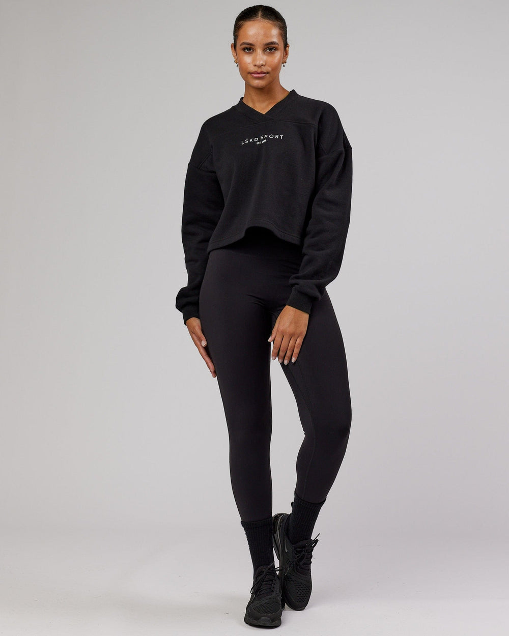 Woman wearing Touchdown Sweater - Black