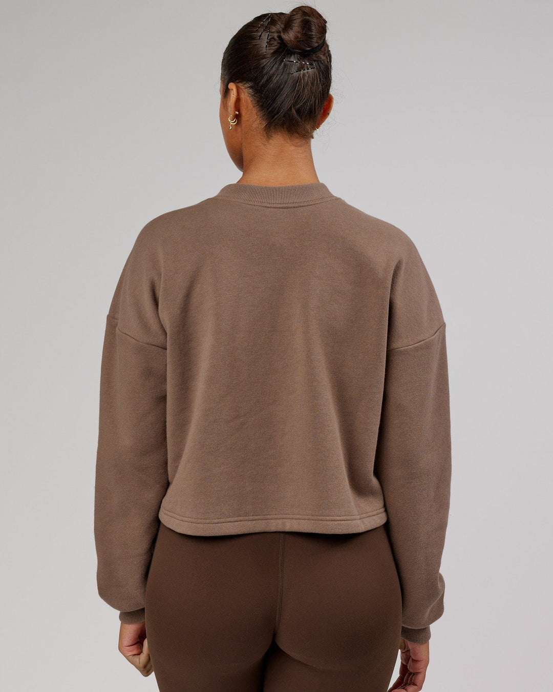 Woman wearing Touchdown Sweater - Deep Taupe