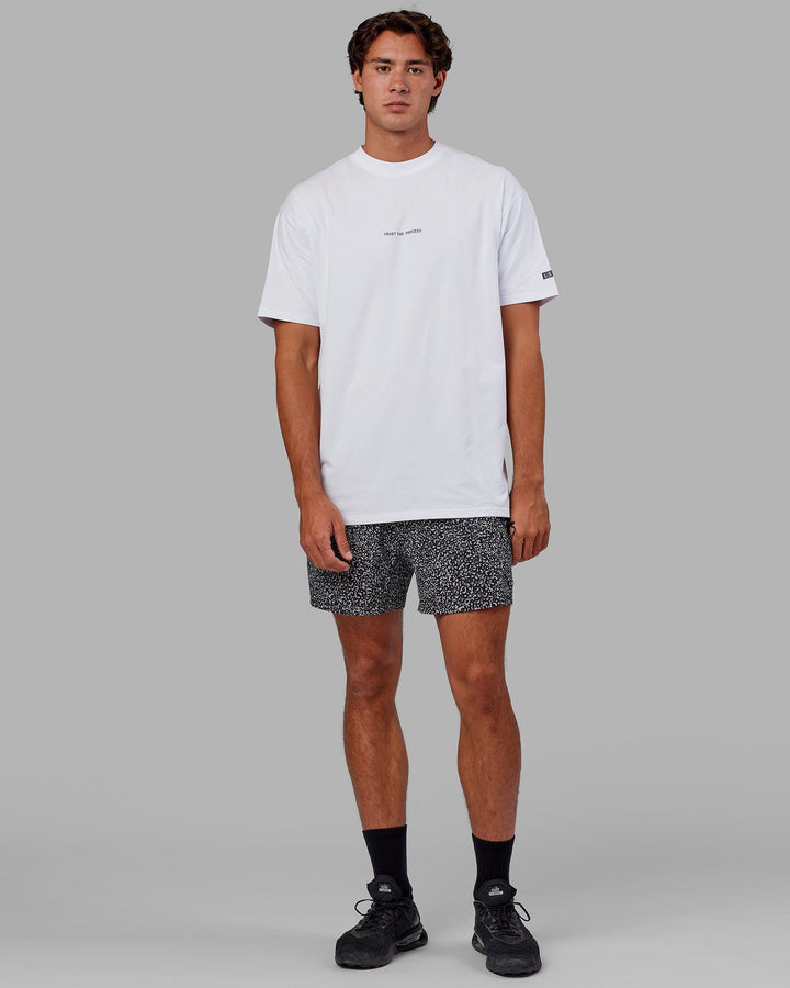 Man wearing Trust The Process FLXCotton Tee Longline Oversize - White