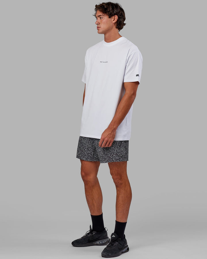 Man wearing Trust The Process FLXCotton Tee Longline Oversize - White