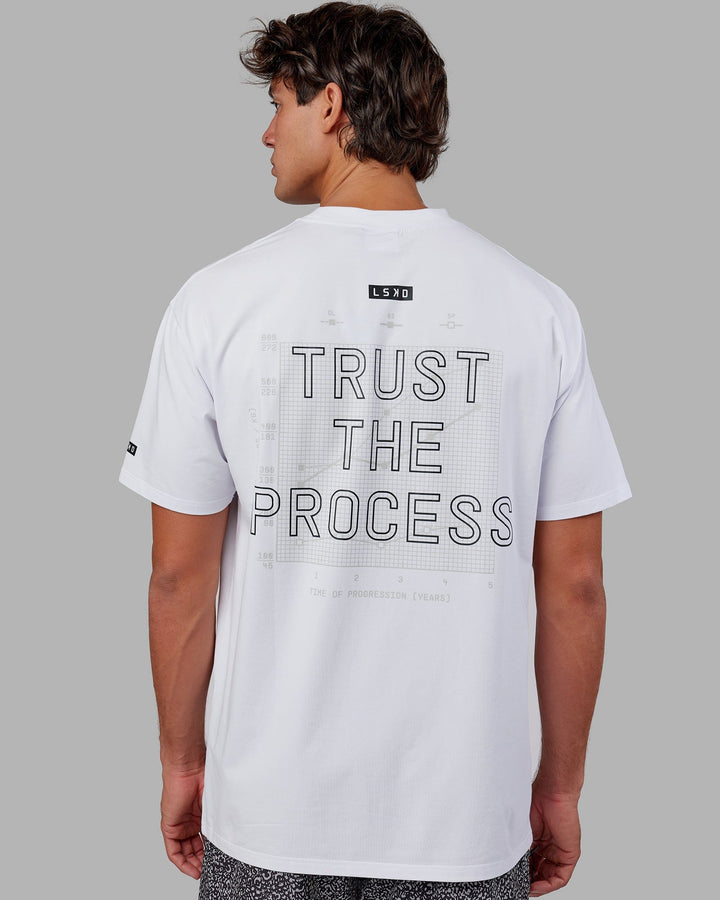Man wearing Trust The Process FLXCotton Tee Longline Oversize - White