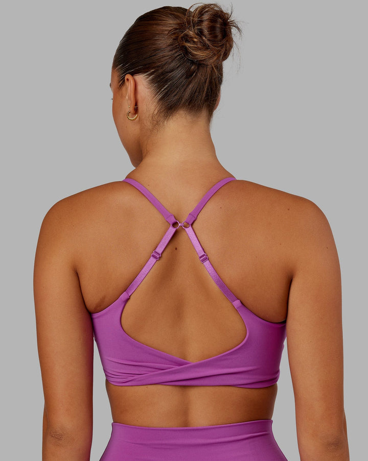 Woman wearing Twist Sports Bra - Orchid