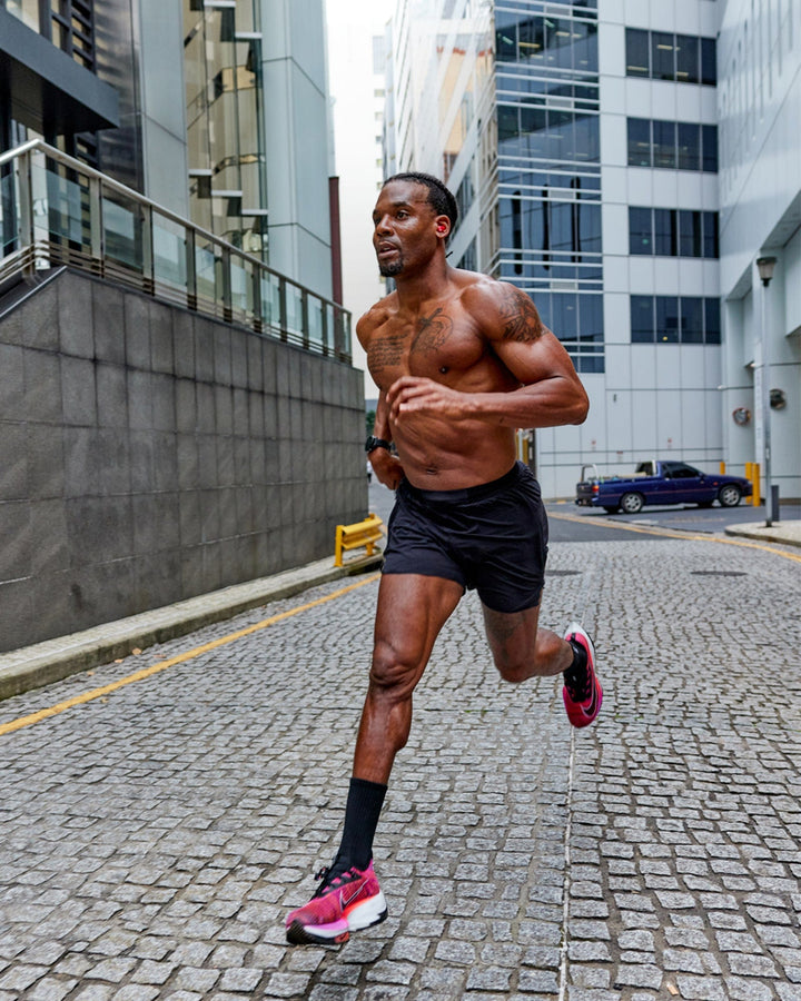 Man wearing UltraAir 6" Lined Performance Short - Black