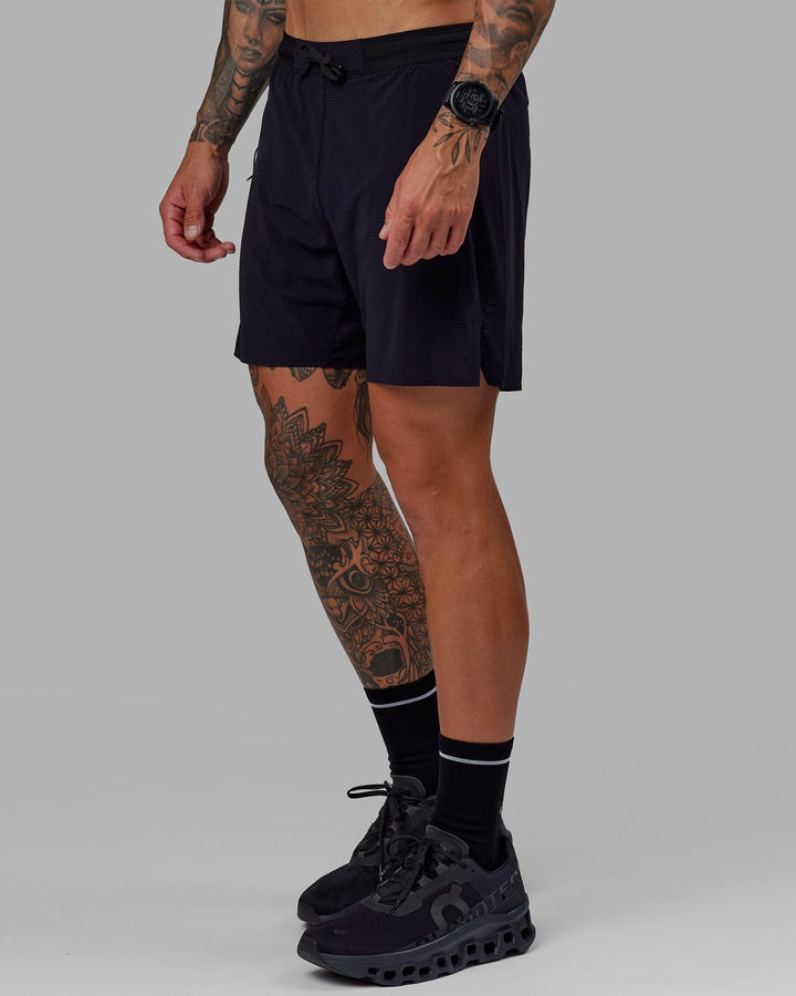 Man wearing UltraAir 6" Lined Performance Short - Black