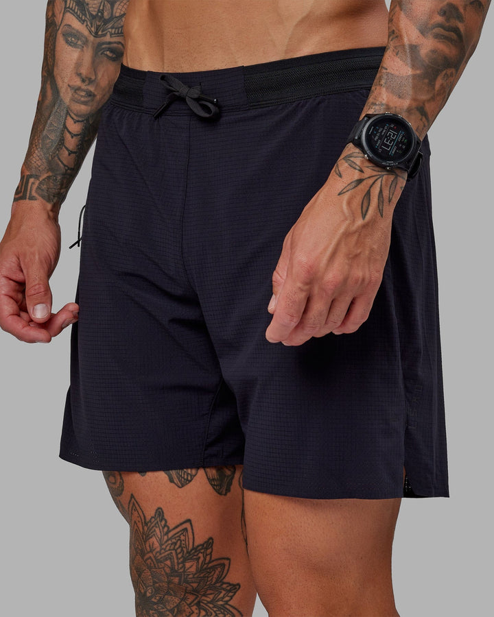 Man wearing UltraAir 6" Lined Performance Short - Black