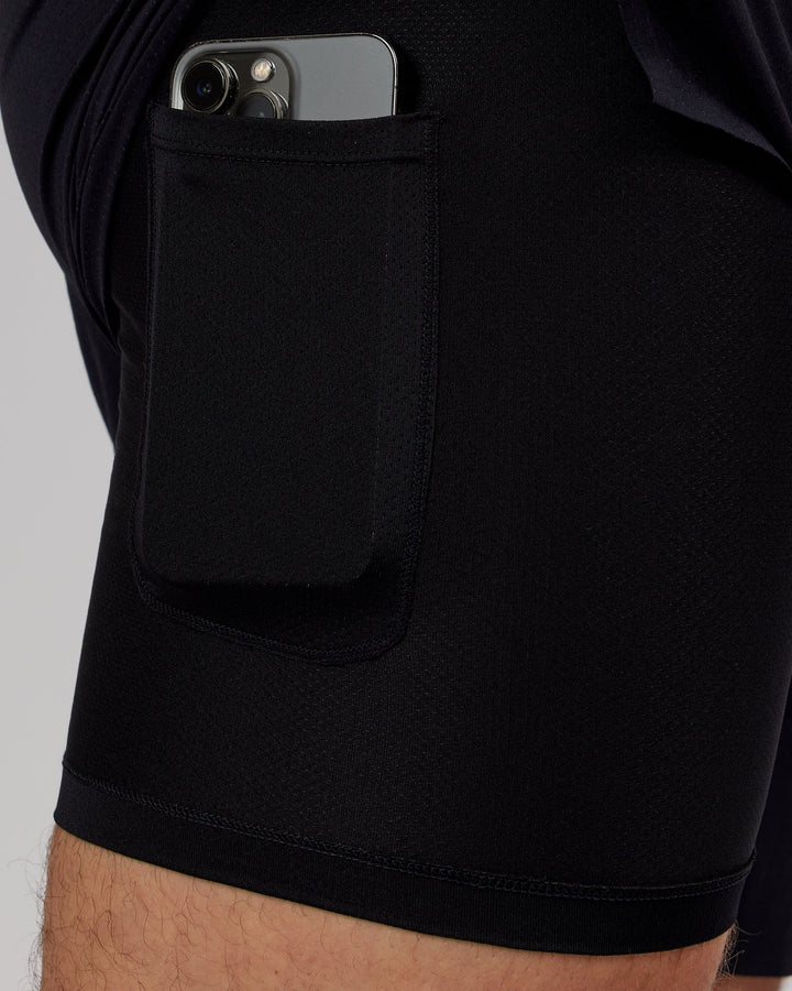 Man wearing UltraAir 6" Lined Performance Short - Black