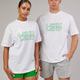 Man and woman wearing Unisex Stacks Up Heavyweight Tee - White-Vivid Green