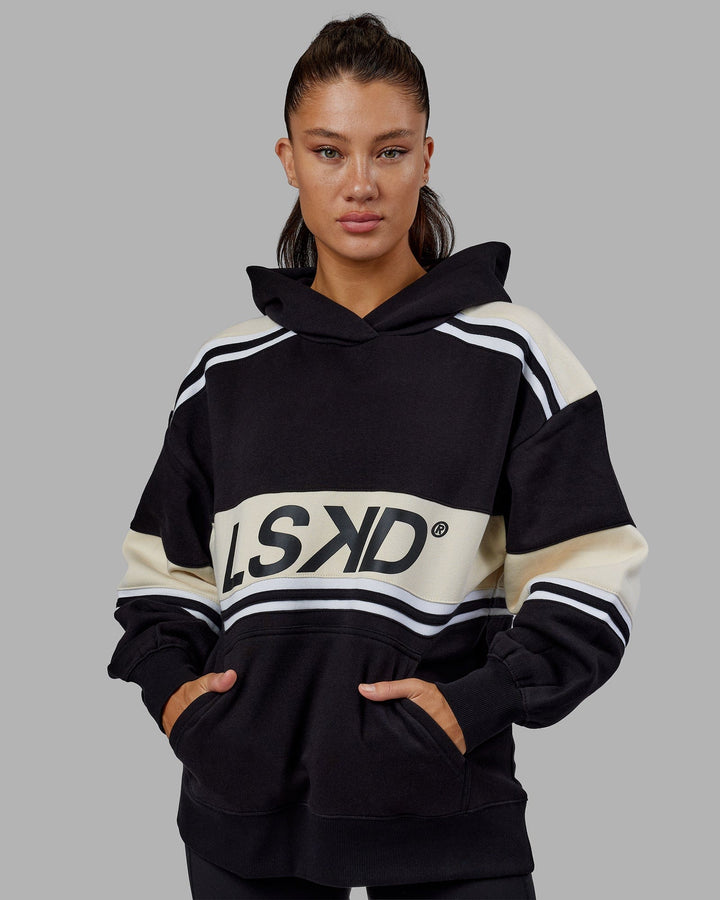 Woman wearing Unisex A-Team Hoodie Oversize - Black-Bone