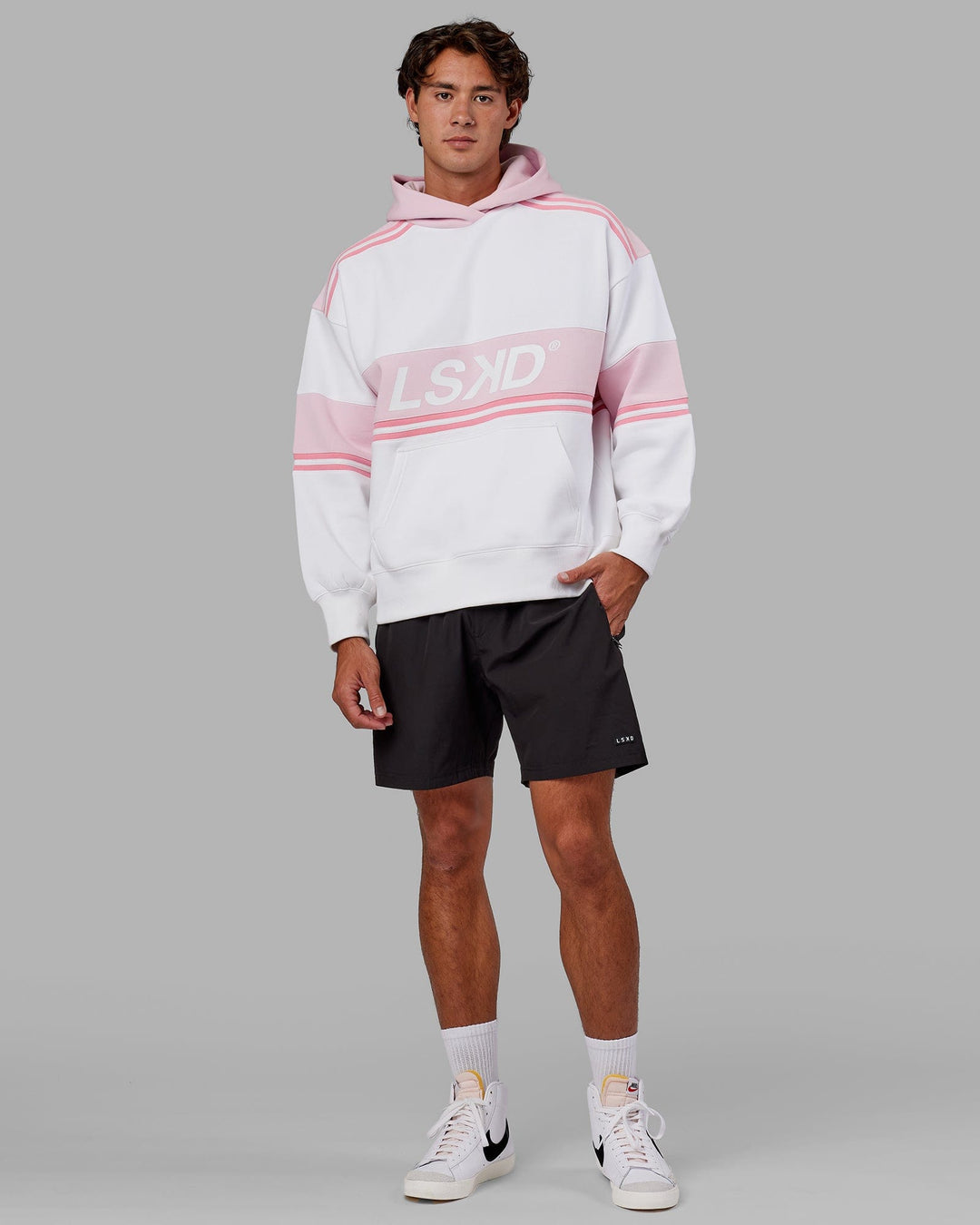 Man wearing Unisex A-Team Hoodie Oversize - White-Petal Pink