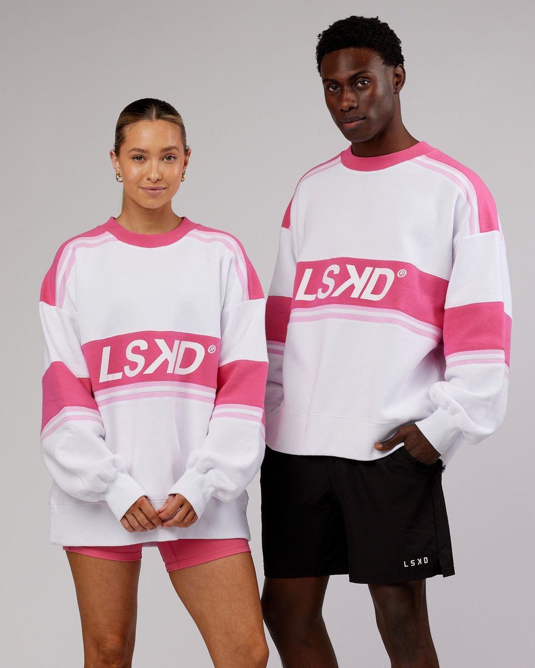 Man and woman wearing Unisex A-Team Sweater Oversize - White-Flamingo
