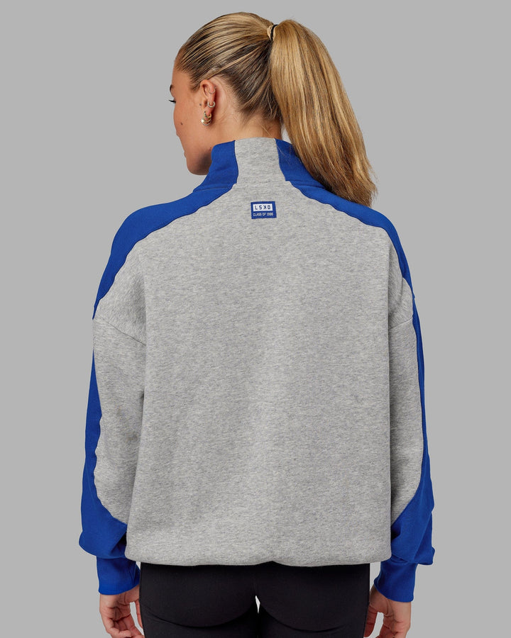 Woman wearing Unisex Alumni 1/4 Zip Sweater Oversize - Grey-Blue