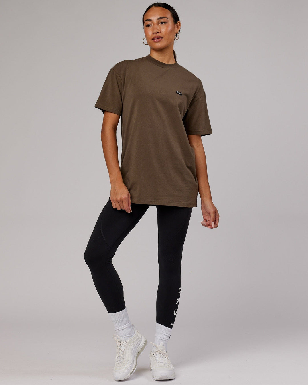  Woman wearing Unisex Capsule FLXCotton Tee Oversize - Army Green