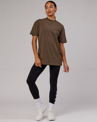  Woman wearing Unisex Capsule FLXCotton Tee Oversize - Army Green