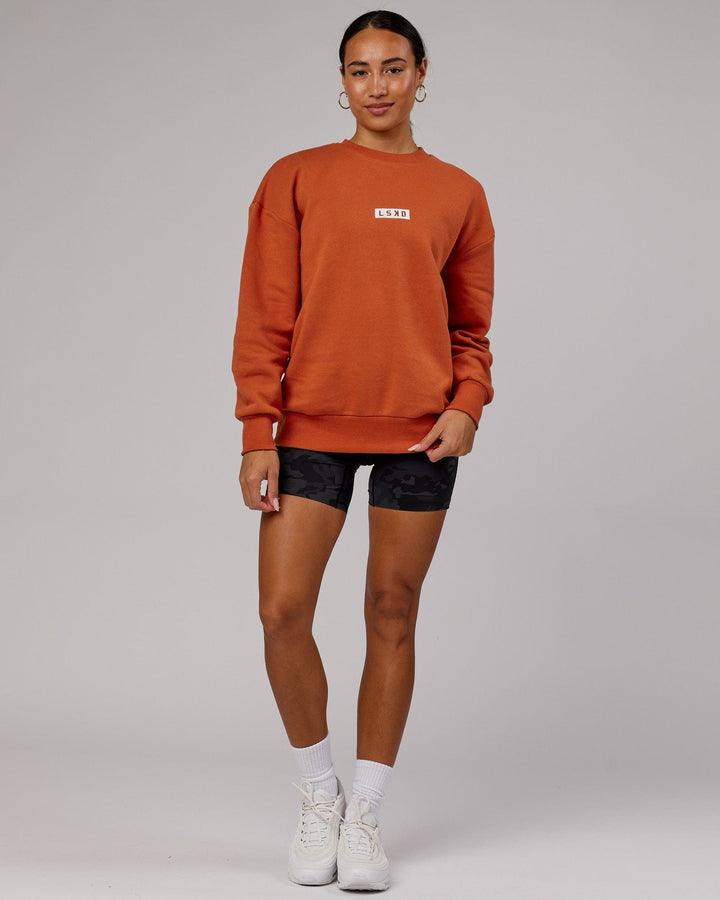 Woman wearing Unisex Cornerstone Sweater Oversize - Auburn
