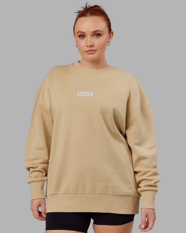 Woman wearing Unisex Cornerstone Sweater Oversize - Pale Khaki