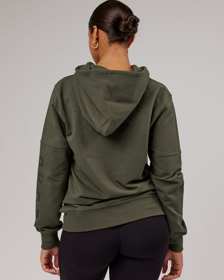 Woman wearing Unisex Direction FLXFleece Hoodie - Forest Night