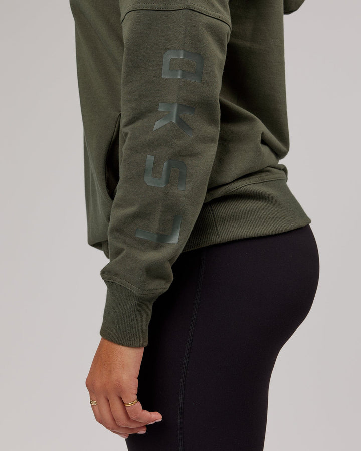 Woman wearing Unisex Direction FLXFleece Hoodie - Forest Night
