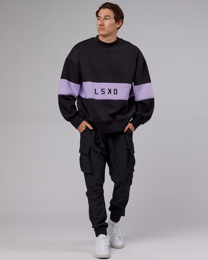 Man wearing Unisex Extra Time Sweater Oversize - Black-Pale Lilac