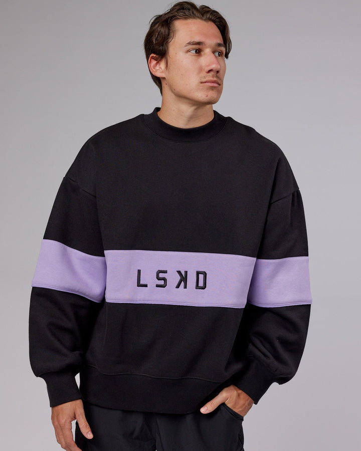 Man wearing Unisex Extra Time Sweater Oversize - Black-Pale Lilac