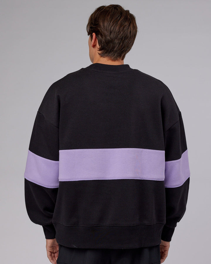 Man wearing Unisex Extra Time Sweater Oversize - Black-Pale Lilac
