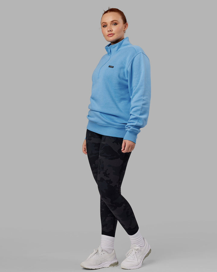 Woman wearing Unisex Fundamental 1/4 Zip Sweater - Azure Blue